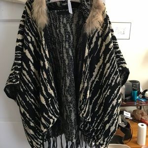 Poncho with fur lined hood